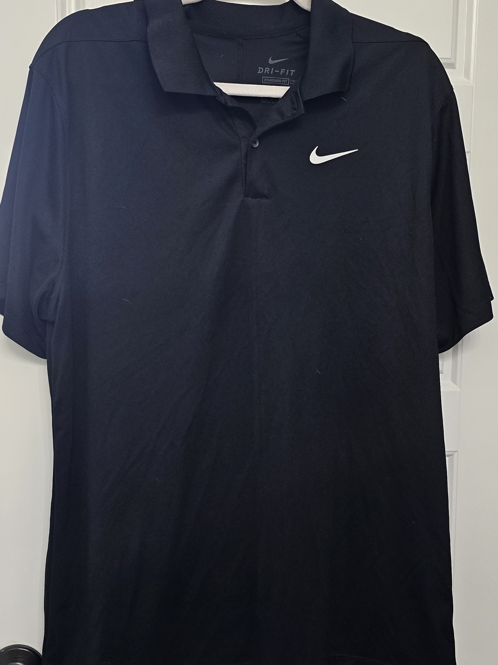 Nike Black Polo Shirt with White Swoosh